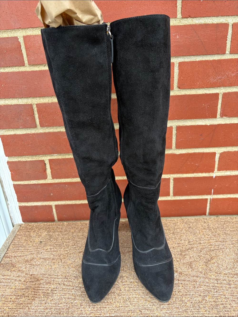 Tod’s black suede boots